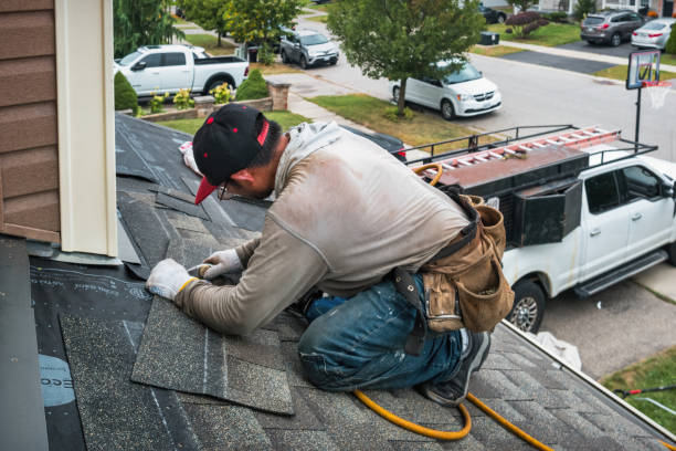 Professional Roofing technician working in Eugene, OR
